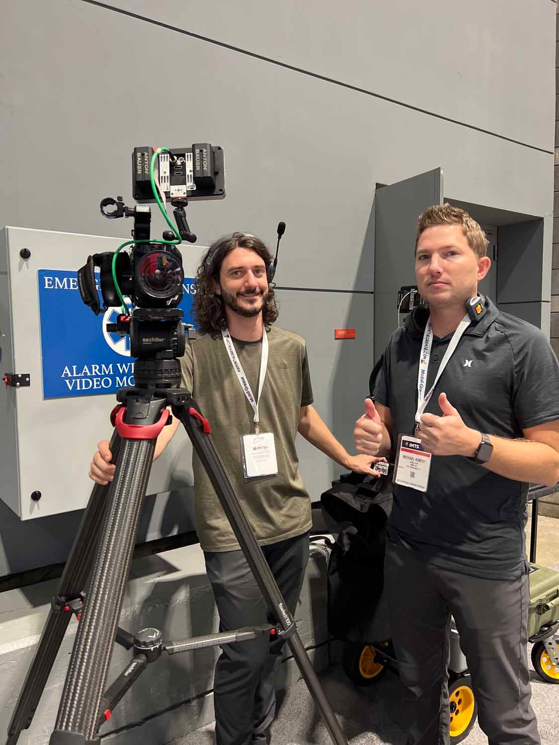 documentary video crew on location at a trade show.